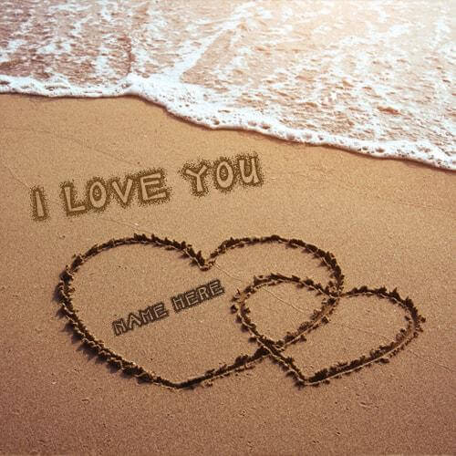 i love you sand writing on the beach